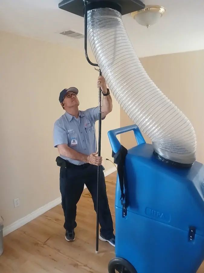 HVAC Installation technician using HEPA equipment in Crystal
